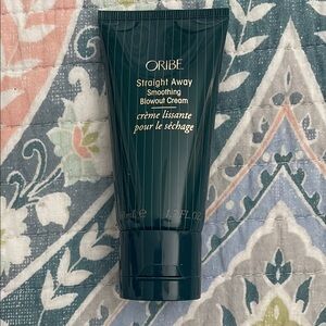 Oribe Smoothing Blowout Cream in Dark Green Tube
